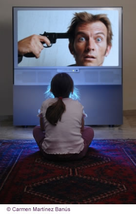 kid watching TV