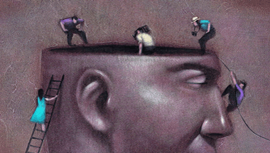 People looking inside man's head