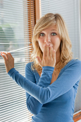 Young  woman looking  shocked